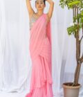 Pink frill saree with mirror-work choli