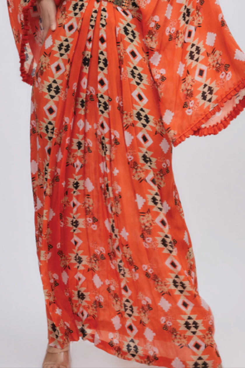Orange printed kaftan with embroidered belt and embellished with shells