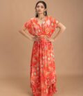 Coral printed kaftan with an embroidered belt and tassels