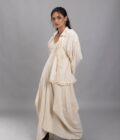 Jacket shirt with kaftan sleeves detailed with fringes