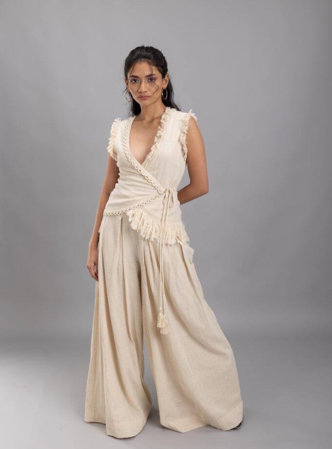 Overlapping vest with fringes and tassels