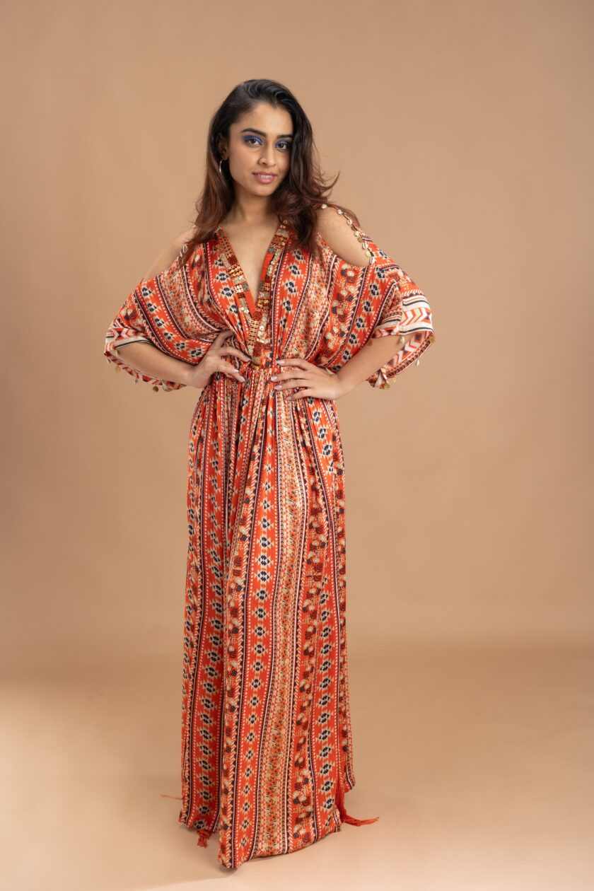 Orange printed kaftan with embroidery on the neck and embellished with tassels - Image 3
