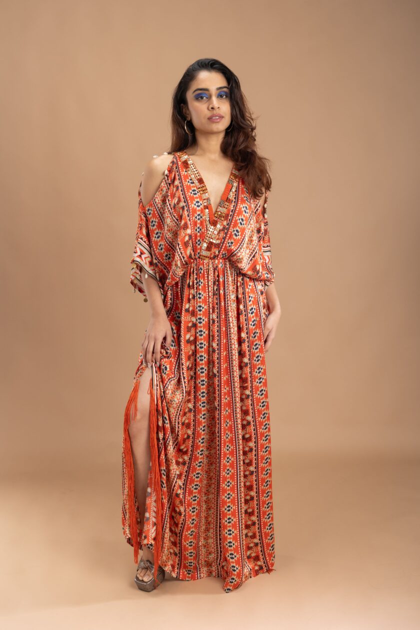 Orange printed kaftan with embroidery on the neck and embellished with tassels - Image 2