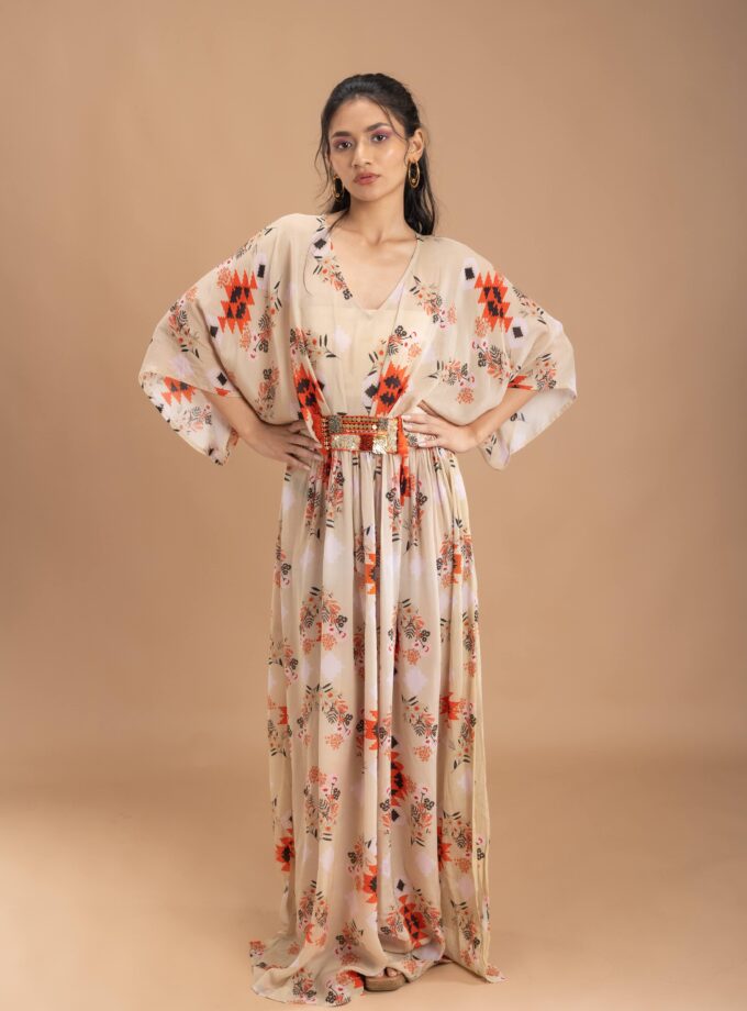 Beige kaftan with an embroidered belt