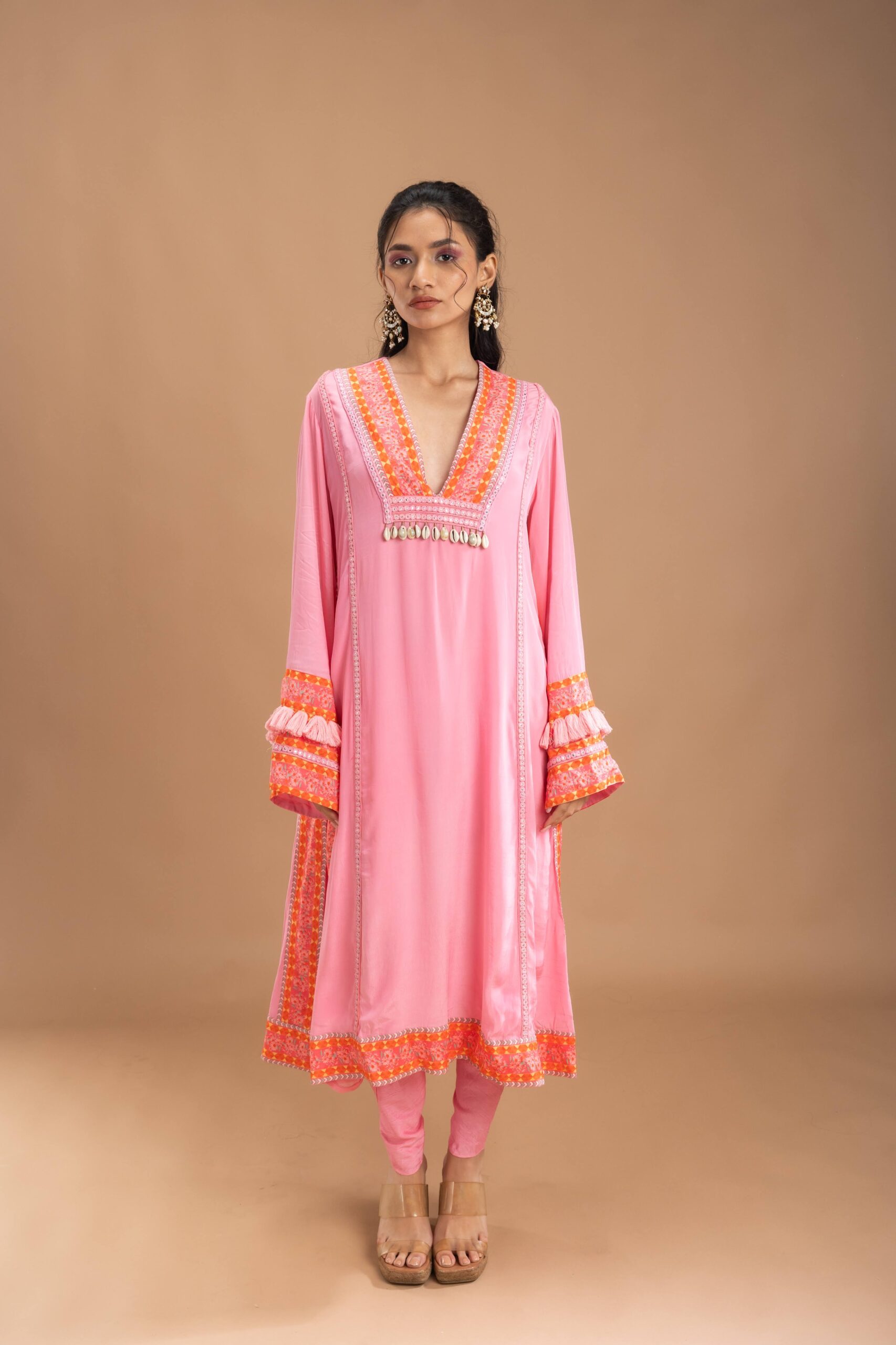 Pink kurta with printed borders embellished with shells