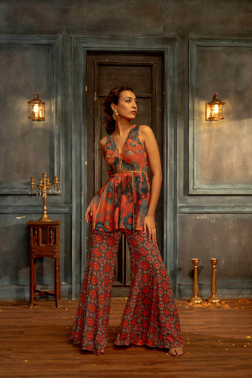 Teal floral embroidered short kurta with bell-bottom  palazzos