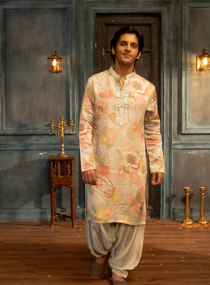 Sky blue printed kurta with mirror work embroidery  and salwar