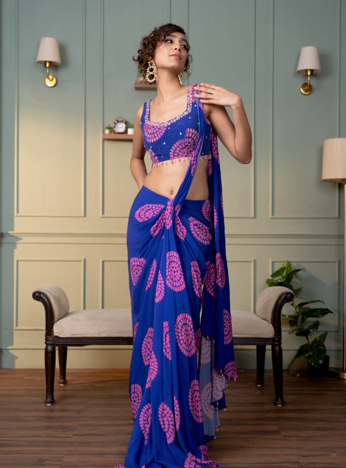 Electric blue polka printed drape saree with  embroidered blouse