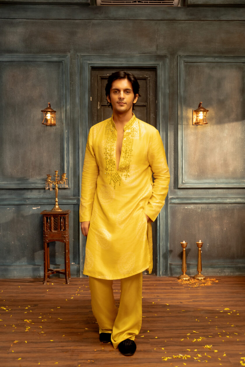 Yellow silk kurta set with mirror work embroidery